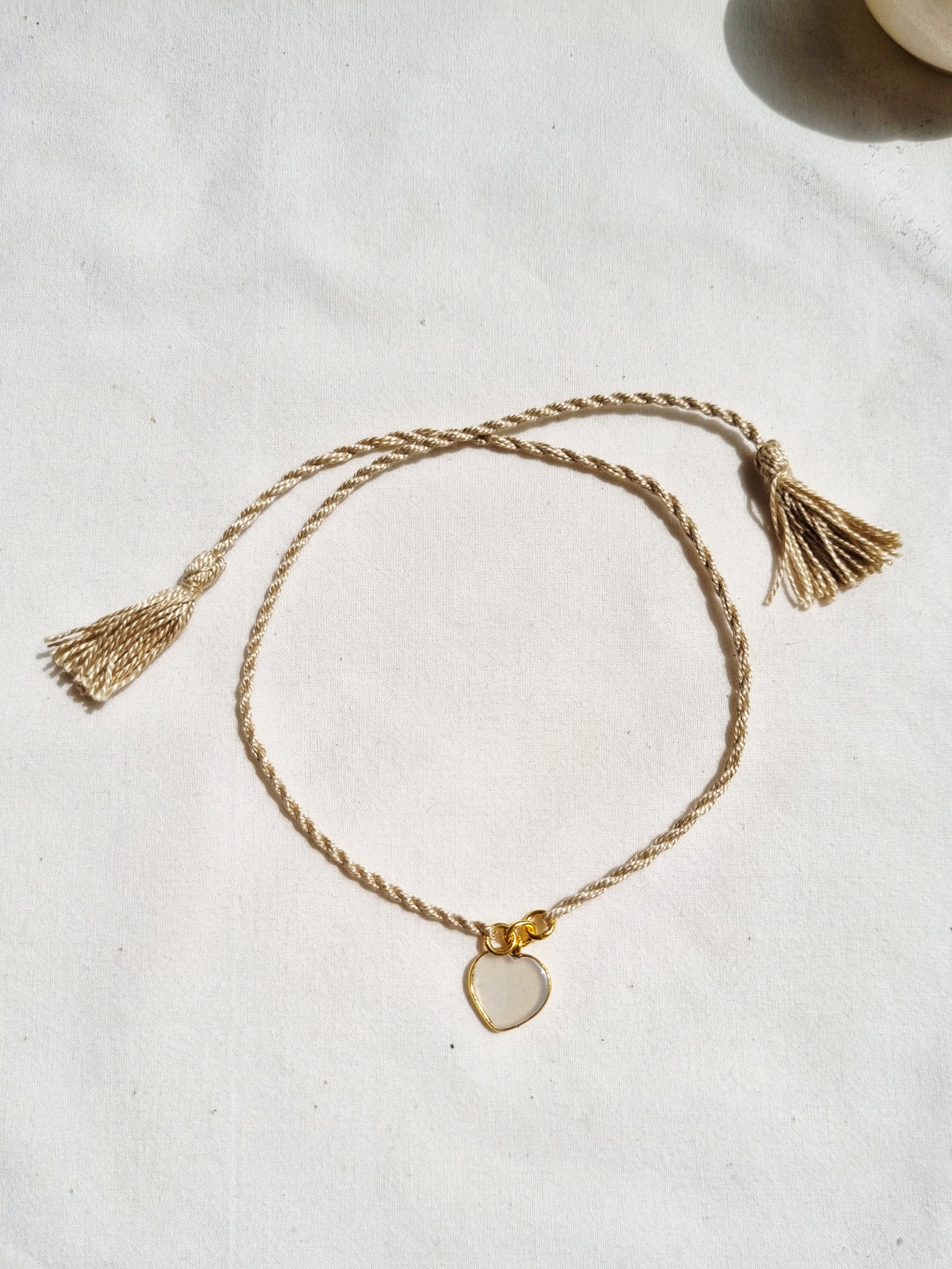 hart - White Moonstone Heart Charm Rakhi