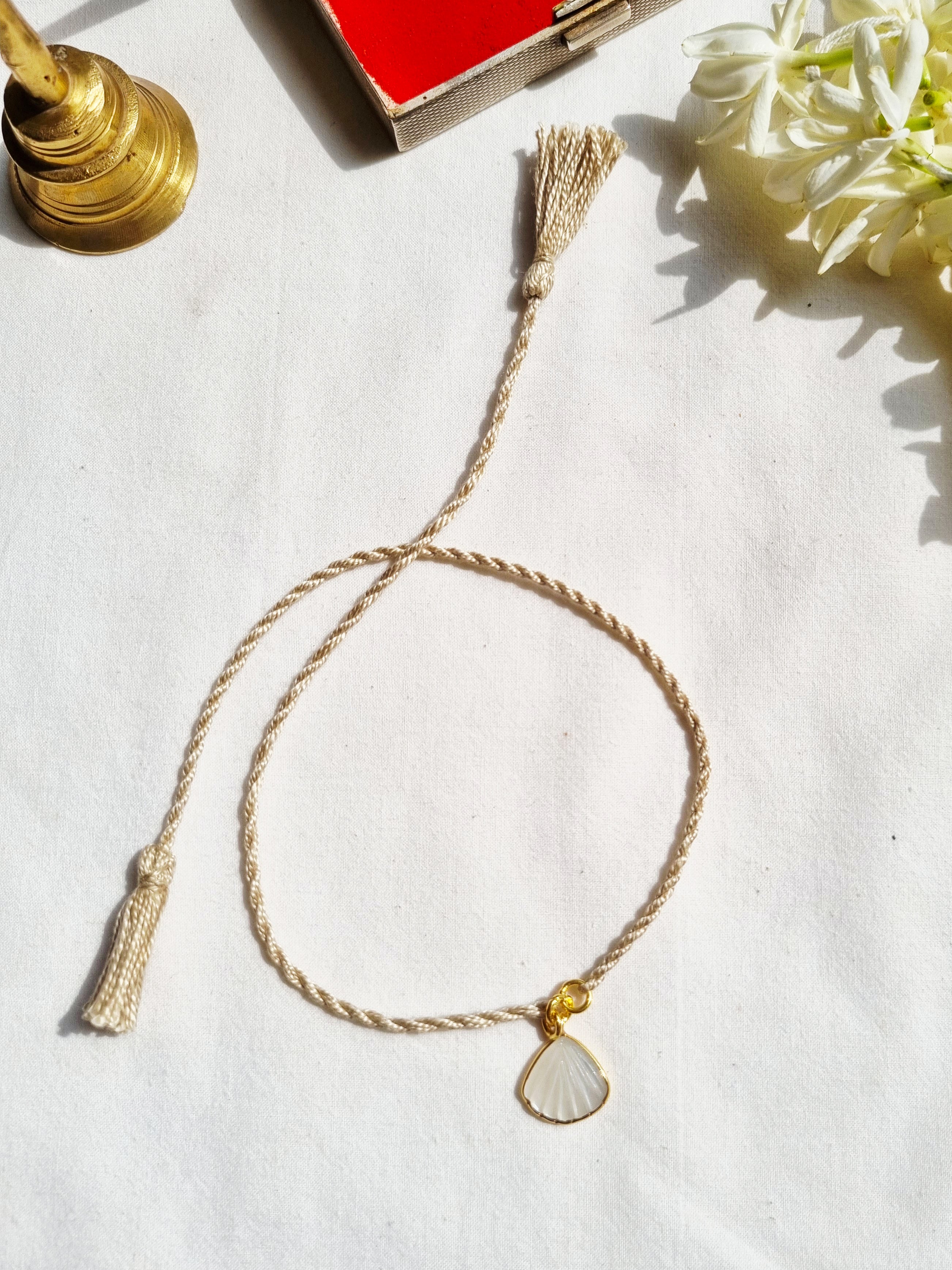 sankha- White Moonstone Shell Charm Rakhi