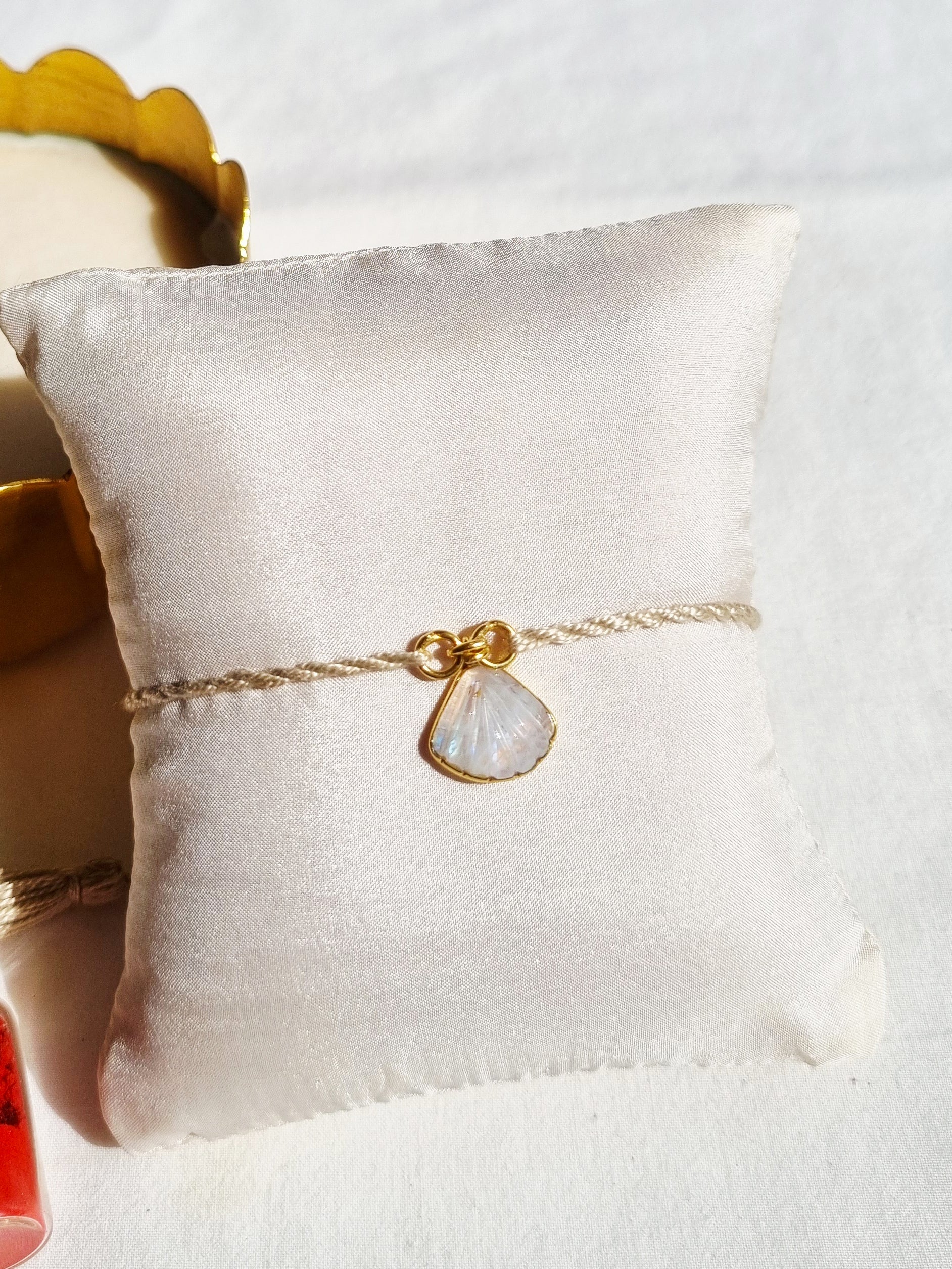 sankha- Rainbow Moonstone Shell Charm Rakhi