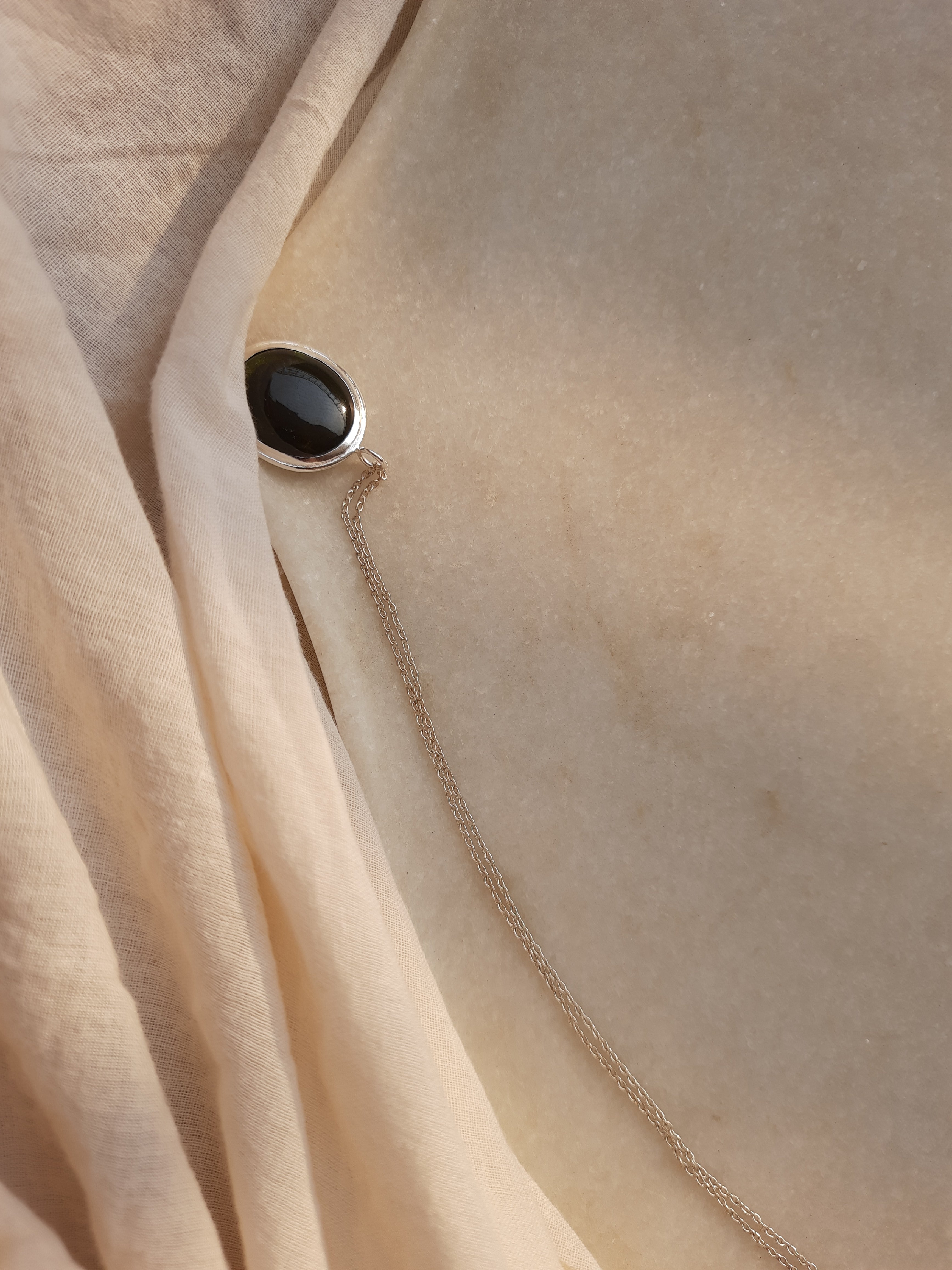 vana - Black Tourmaline Oval Pendant