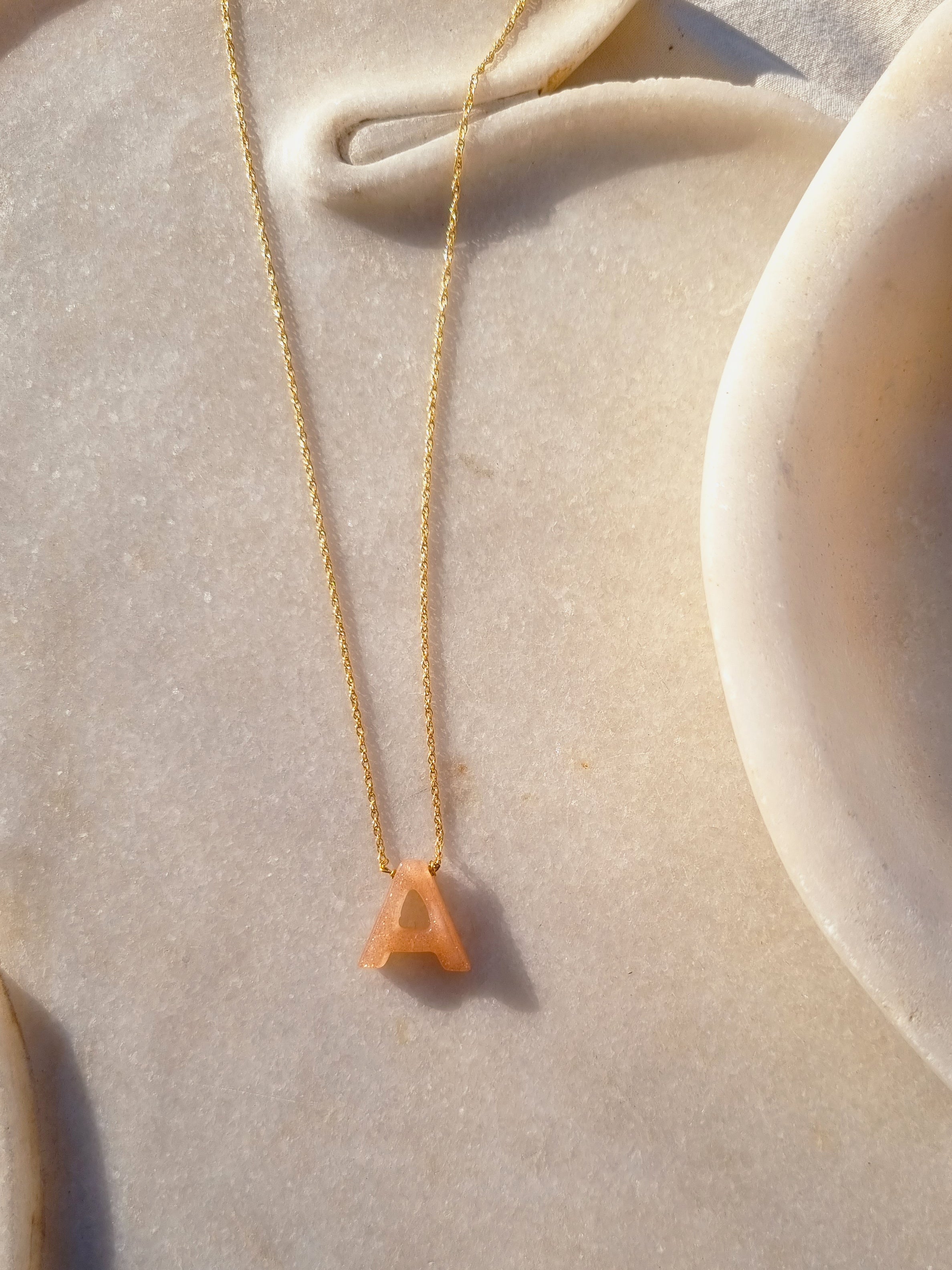 aras - Peach Moonstone akshara