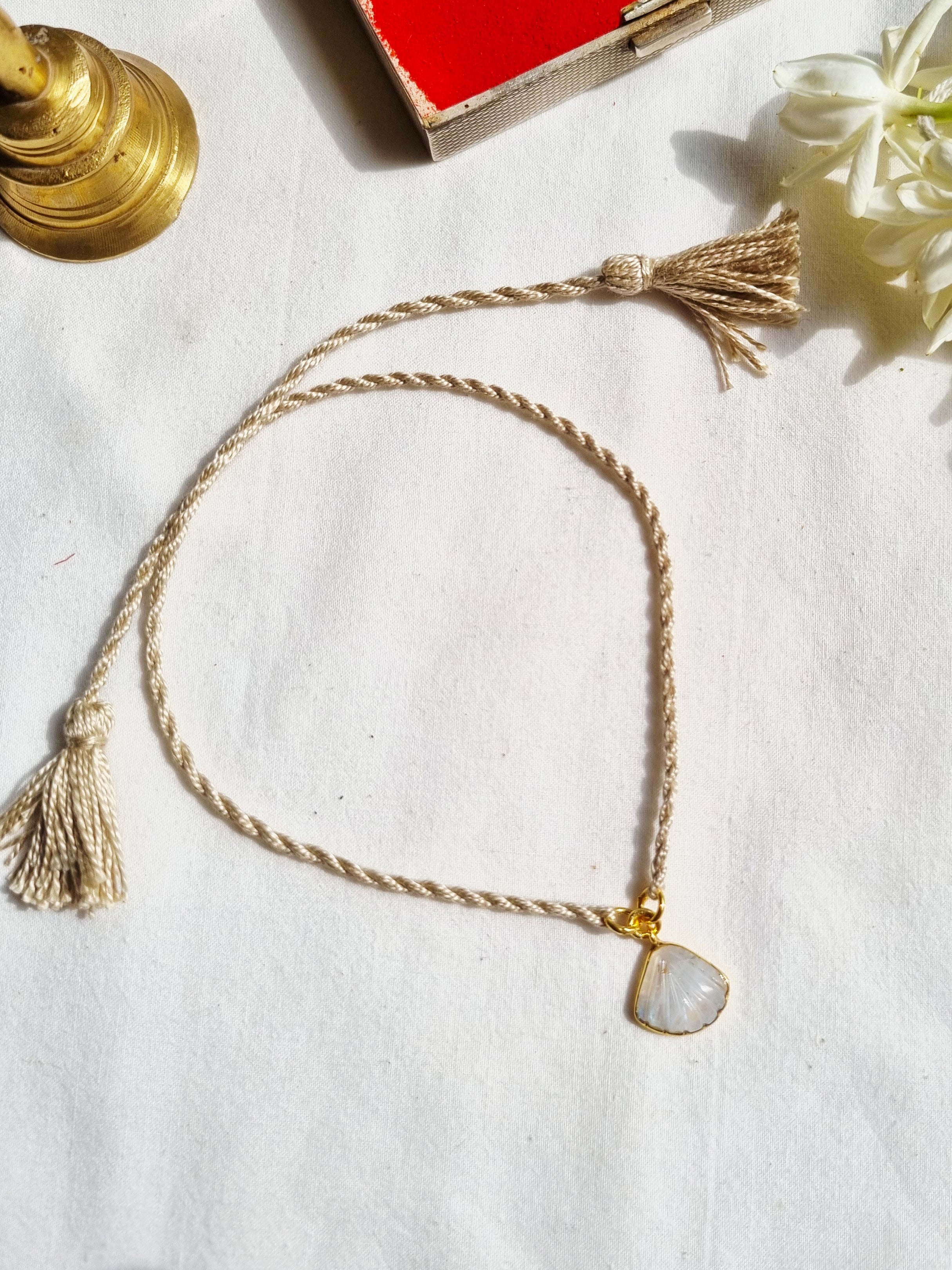 sankha- Rainbow Moonstone Shell Charm Rakhi