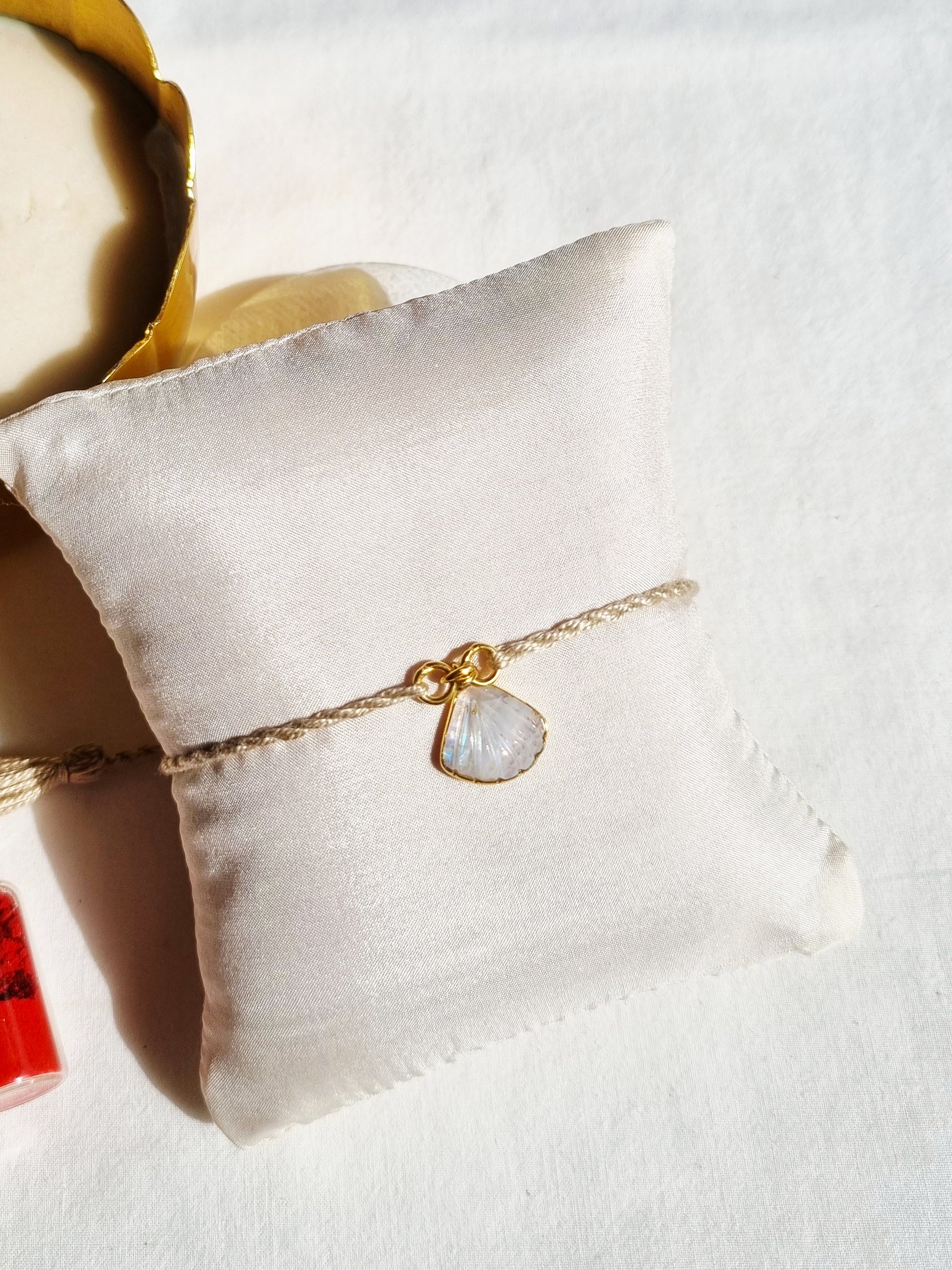 sankha- Rainbow Moonstone Shell Charm Rakhi