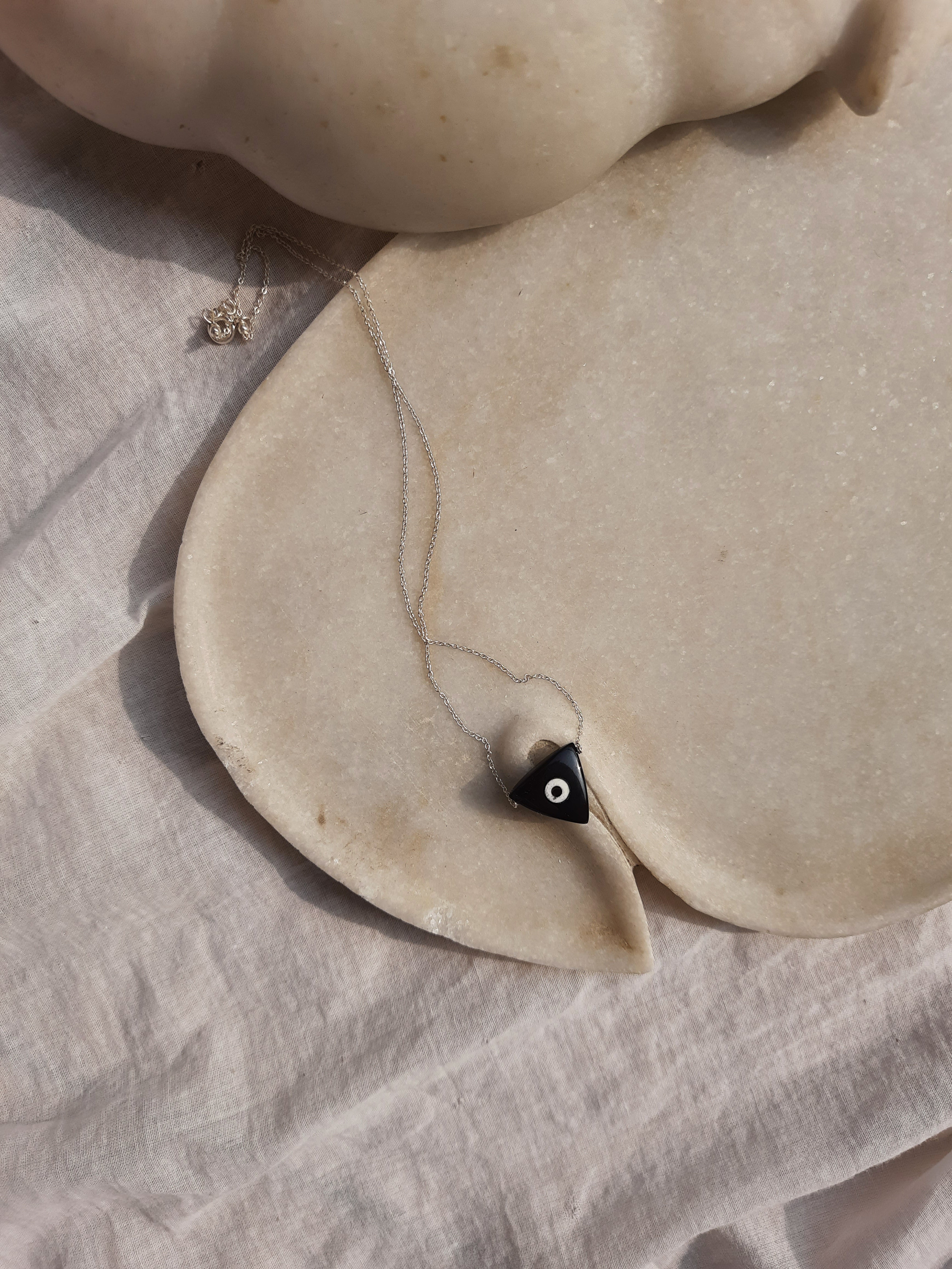 nirva - Black Onyx Tikona Evil Eye Pendant